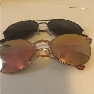 two pairs of sun glasses
